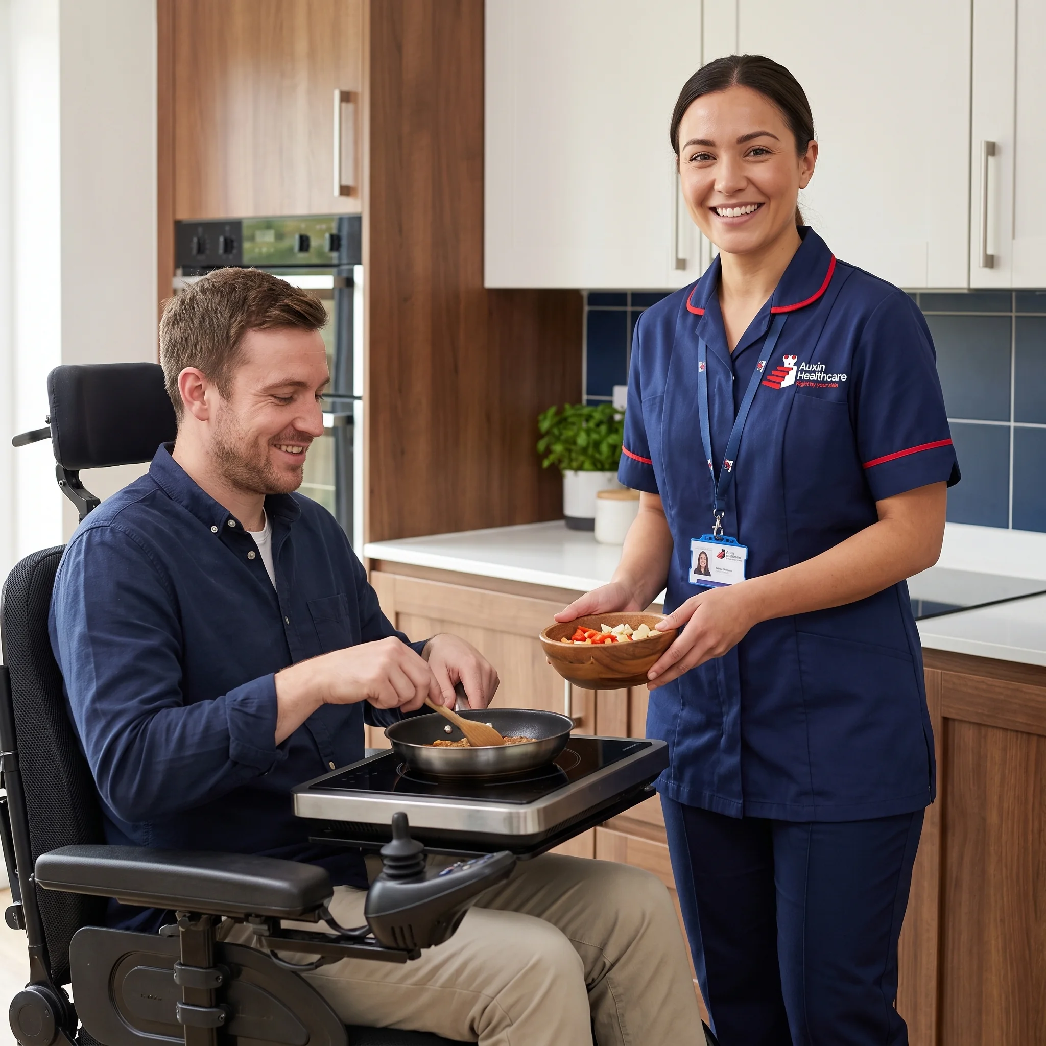 Man using a powered wheelchair cooking in an accessible kitchen with support from an Auxin support worker